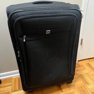 Delsey 27” expanding suitcase